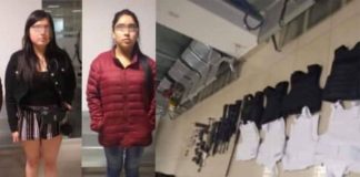 The young women and their weapons stash.