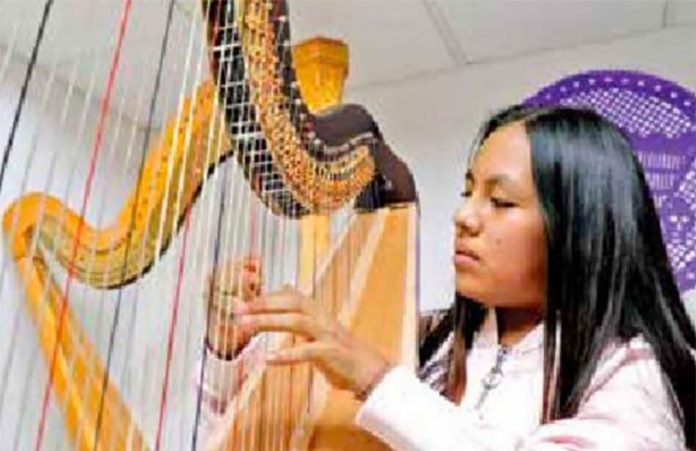 Harpist Morales is off to Carnegie Hall.