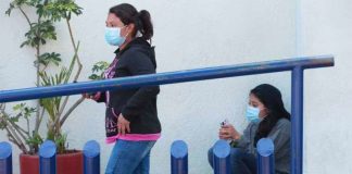 Face masks began appearing in Mexico City on Friday.