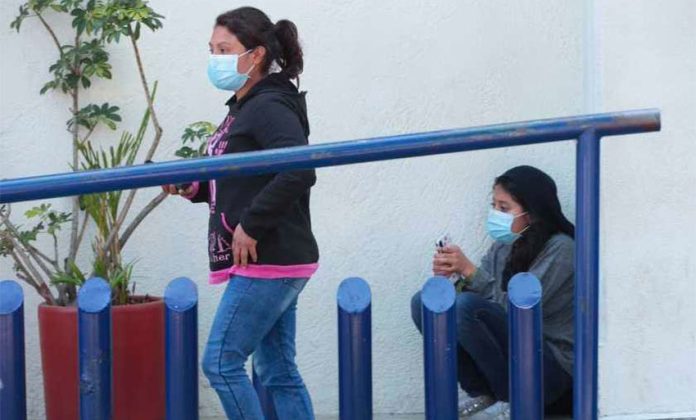 Face masks began appearing in Mexico City on Friday.