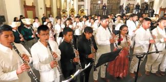 Musicians give a performance the presidential press conference.