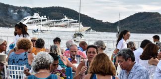 Diners feast on paella in Zihuatanejo.