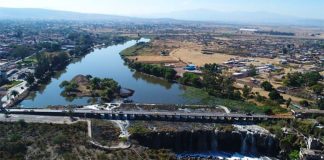 Cleaning up the Santiago River has begun, governor says.
