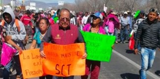 Transportation official Meza at Thursday's protest march.