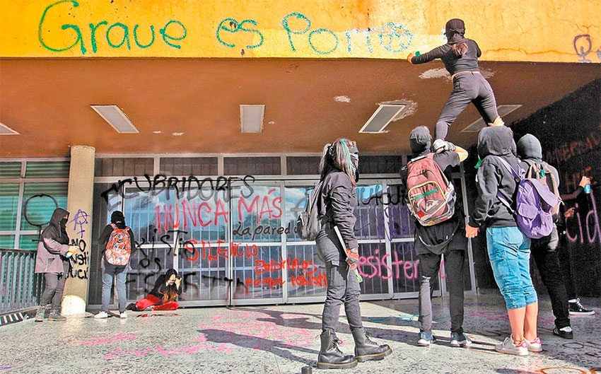 Masked and hooded students on the rampage.