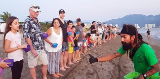 Last minute instructions are given to visitors at the turtle camp in Puerto Vallarta.