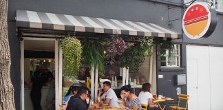 Restaurant mascot Pancho Vegan welcomes guests to Roma's best new restaurant.