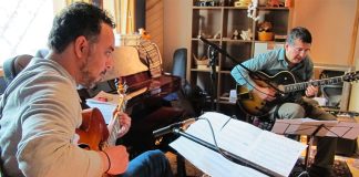 Aispuro, left, in the studio.