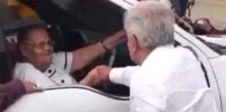 The president greets El Chapo's mother in Sinaloa on Sunday.