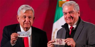 López Obrador, left, and lotteries chief Ernesto Prieto with raffle tickets.