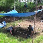 Schroder, left, and Scherer excavate in the ballcourt
