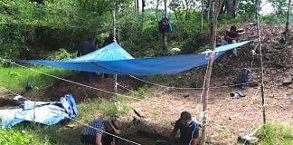Schroder, left, and Scherer excavate in the ballcourt