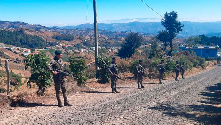 Guatemalan soldiers guard the border with Mexico.