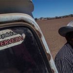'Water is for producing food not beer,' reads the sticker.
