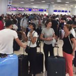 Lineups at Cancún airport as travelers attempt to flee.