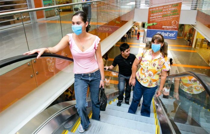 Masked shoppers in Mexico City this week.