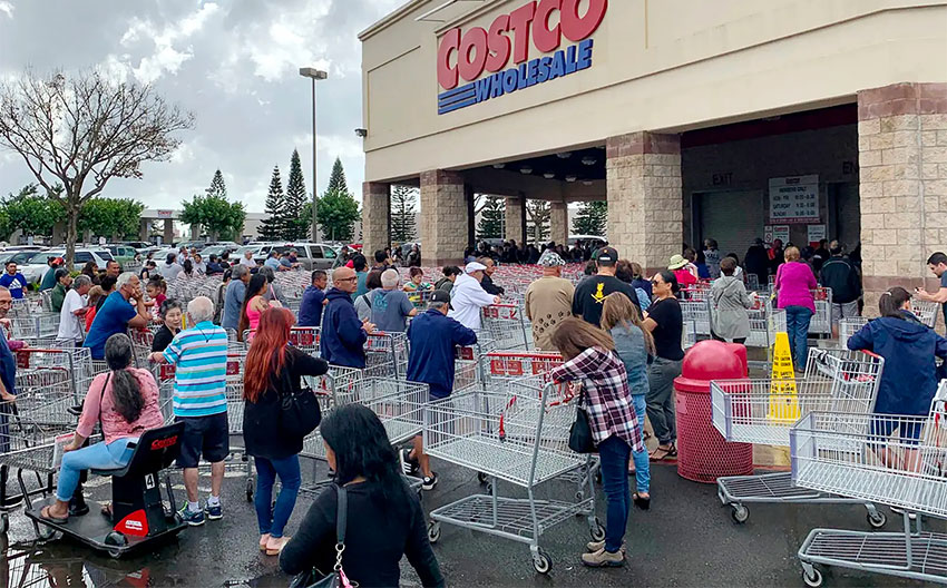 Panic buying triggers a lineup at a Costco store in the US.