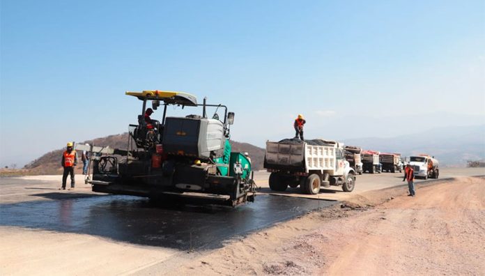 Paving under way on the new highway in Oaxaca.