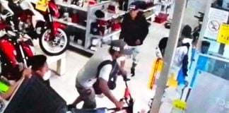 A security camera catches looters in a store in Chimalhuacan, México state.