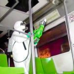 A Mexico City Metro worker disinfects a rail car.