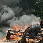 Migrants' belongings burn in Palenque, Chiapas.