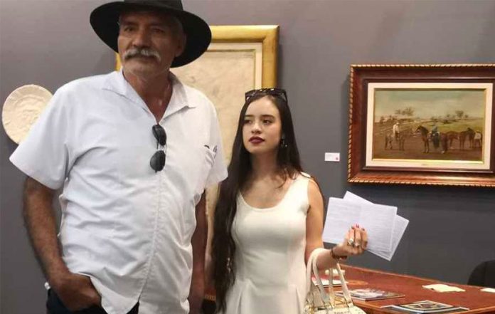 Mireles and his wife at an art exhibition in Mexico City last month.