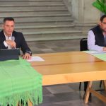 Governor Murat, left and Health Minister Casas.