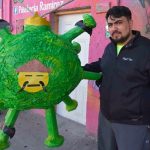 Ramírez and his coronavirus piñata.