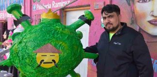 Ramírez and his coronavirus piñata.
