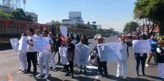 Medical personnel protest in Mexico City on Tuesday.