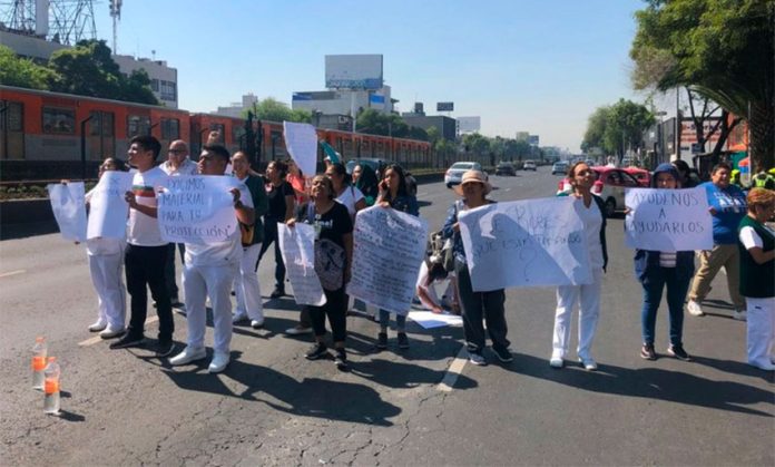 Medical personnel protest in Mexico City on Tuesday.
