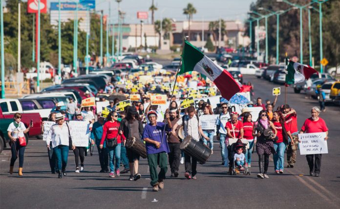 Protesters march last year in protest against the Mexicali brewery.