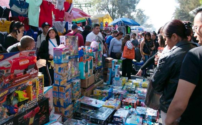 Mexico City vendors must continue to pay extortion even as sales decline.