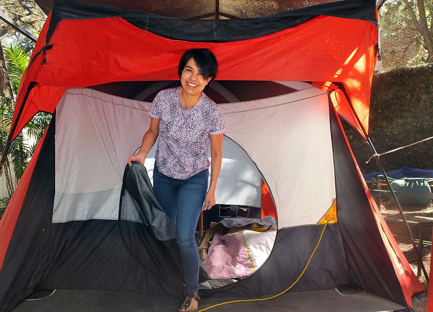 Ibarra shows off the tent she sleeps in every night.