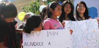 Students at the opening of a new school built with the help of the Escalera Foundation.
