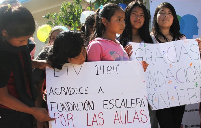Students at the opening of a new school built with the help of the Escalera Foundation.