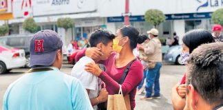 Where's the body? Family members at the hospital where Ángel Dorado died.