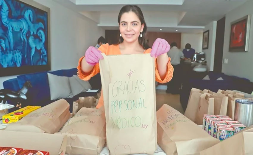 One of Gurría's friends prepares breakfasts for delivery.