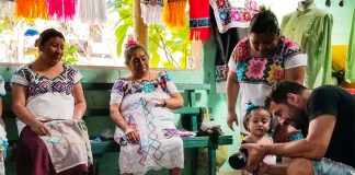 Filmmaker Manos Mitikas while filming Mayan seamstresses in Quintana Roo.