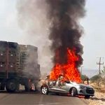 A vehicle burns Tuesday in a Guanajuato roadblock.