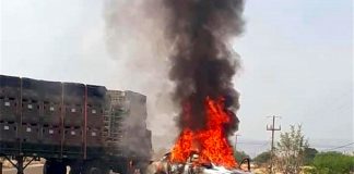 A vehicle burns Tuesday in a Guanajuato roadblock.