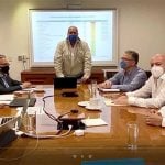 Governor Alfaro, center, at a meeting of senior officials on Monday.