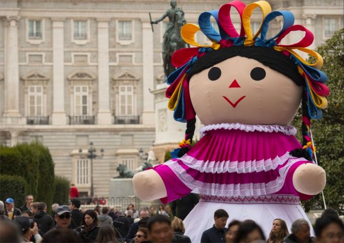 Lele, a giant-sized María doll that has traveled the world to promote Mexican tourism.