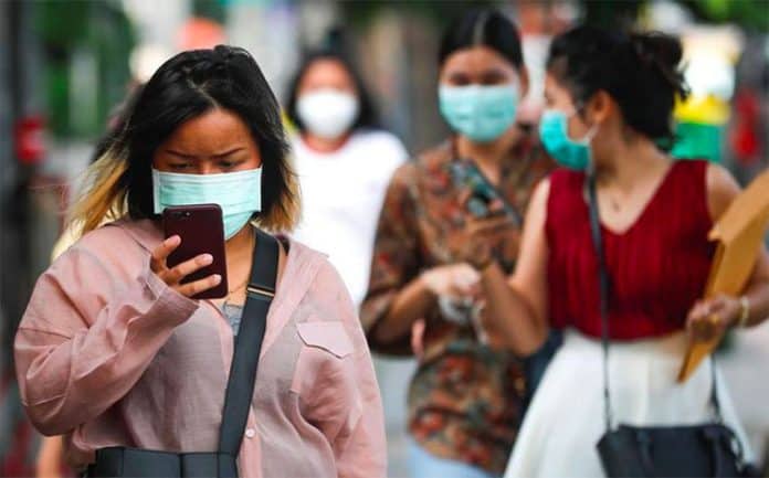 Masks can help slow spread of the virus, academics say.