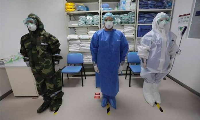 Navy medical personnel at the ready at a Mexico City hospital.