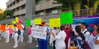 Health workers protest Friday in Acapulco.