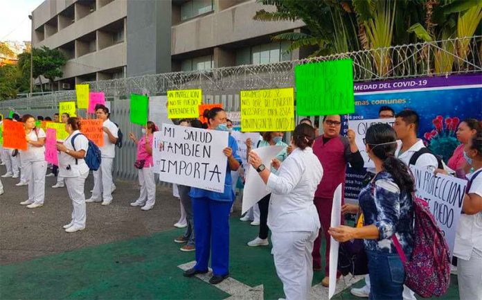 Health workers protest Friday in Acapulco.