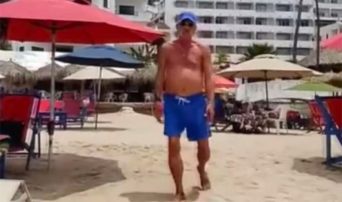 One of two tourists who harassed and assaulted a reporter on a Puerto Vallarta beach.