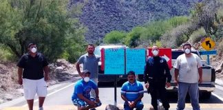San Javier residents block the road into their community in light of the coronavirus emergency.