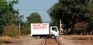 A truck blocks the tracks in Michoacán during a protest by teacher training students on Tuesday.
